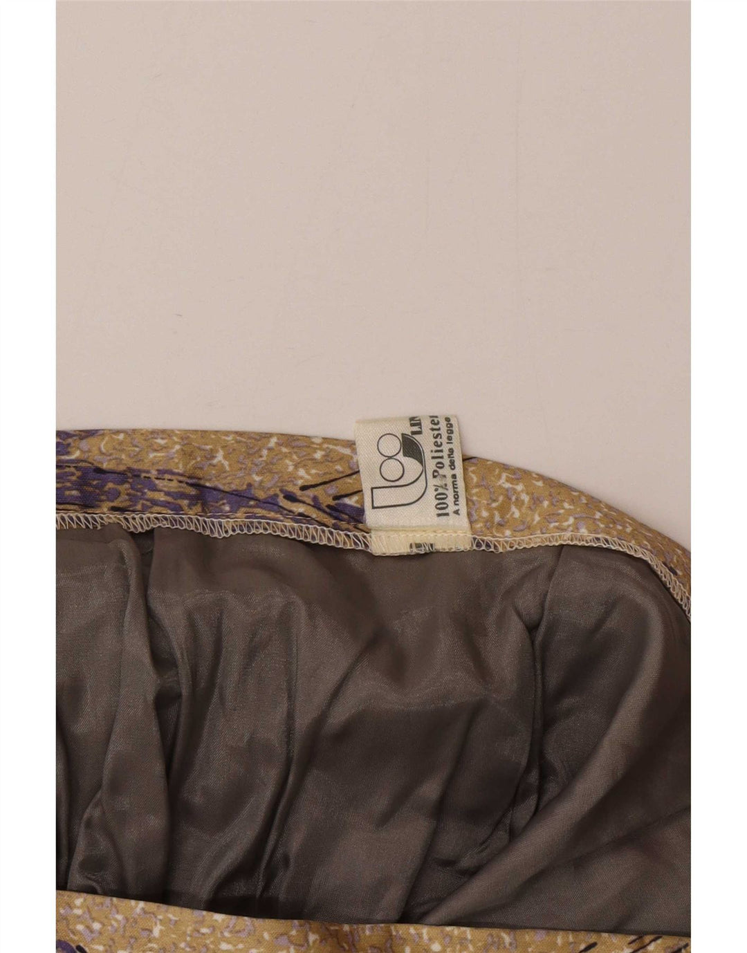 Vintage mujer patrón abstracto una línea falda W34 poliéster beige grande