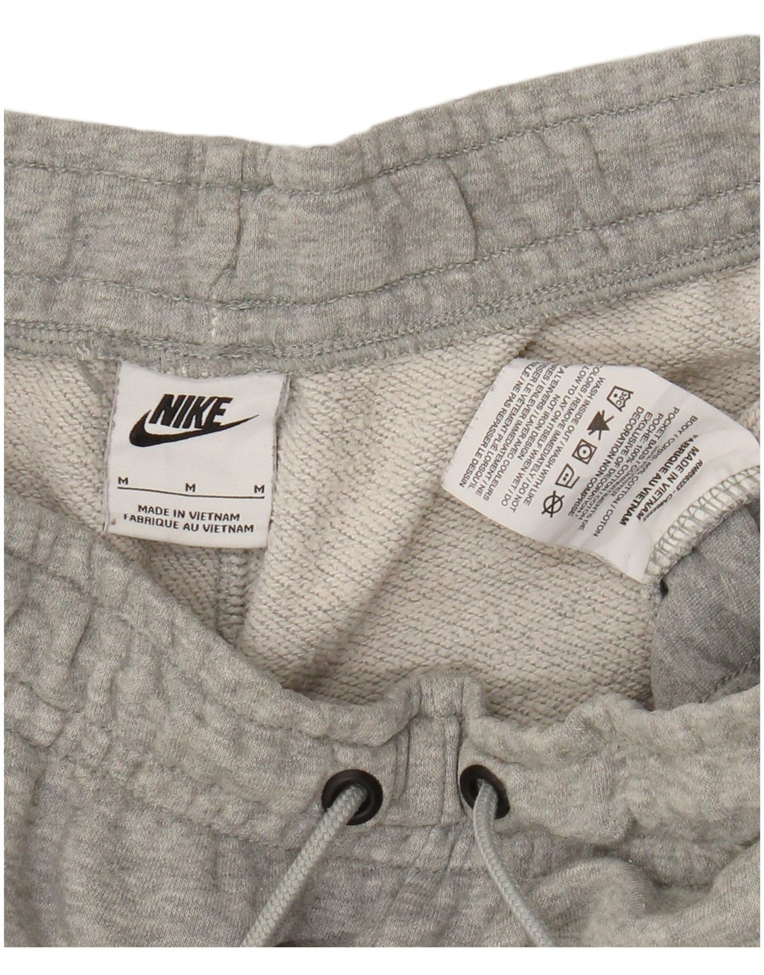 Nike - Pantalones de chándal para mujer, talla 40, color gris medio