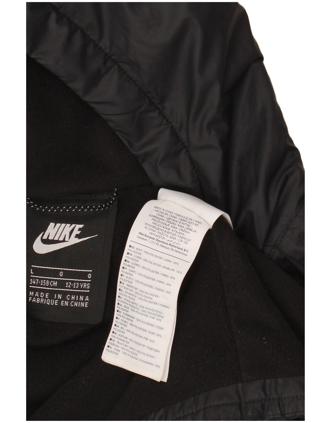 Nike Chaqueta cortavientos con capucha para niños 12-13 años Grande Poliéster negro