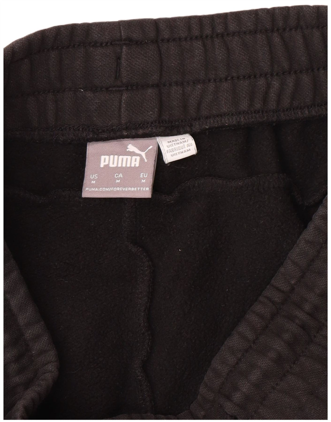 PUMA Pantalones de chándal con estampado gráfico Joggers Medium Black para hombre