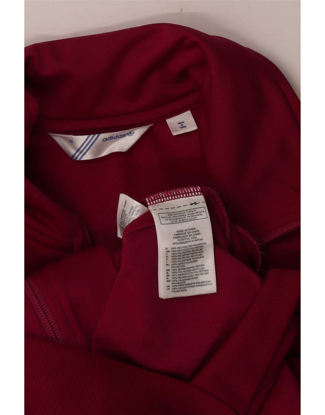 Adidas Chaqueta superior de chándal gráfico para mujer EU 38 Poliéster burdeos medio