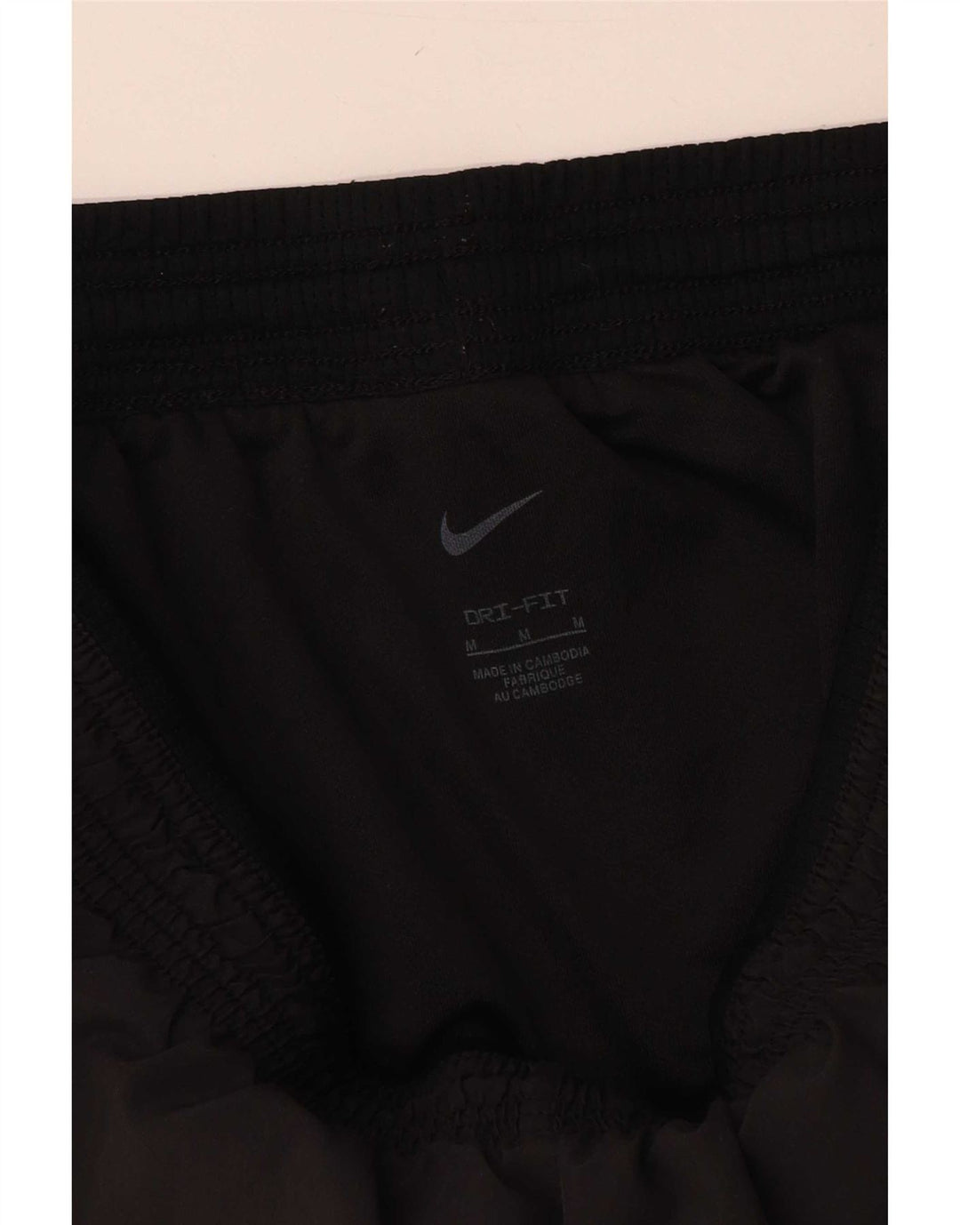 Nike - Pantalones cortos deportivos Dri Fit para mujer, talla M, poliéster negro