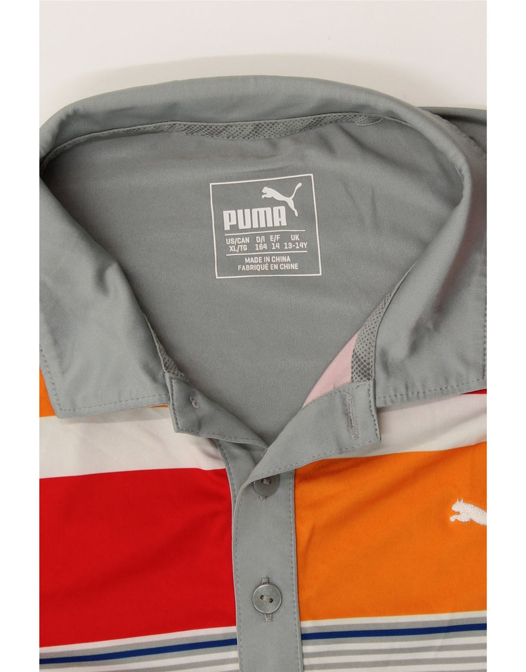 PUMA Polo gráfico para niño 13-14 años Gris Rayas