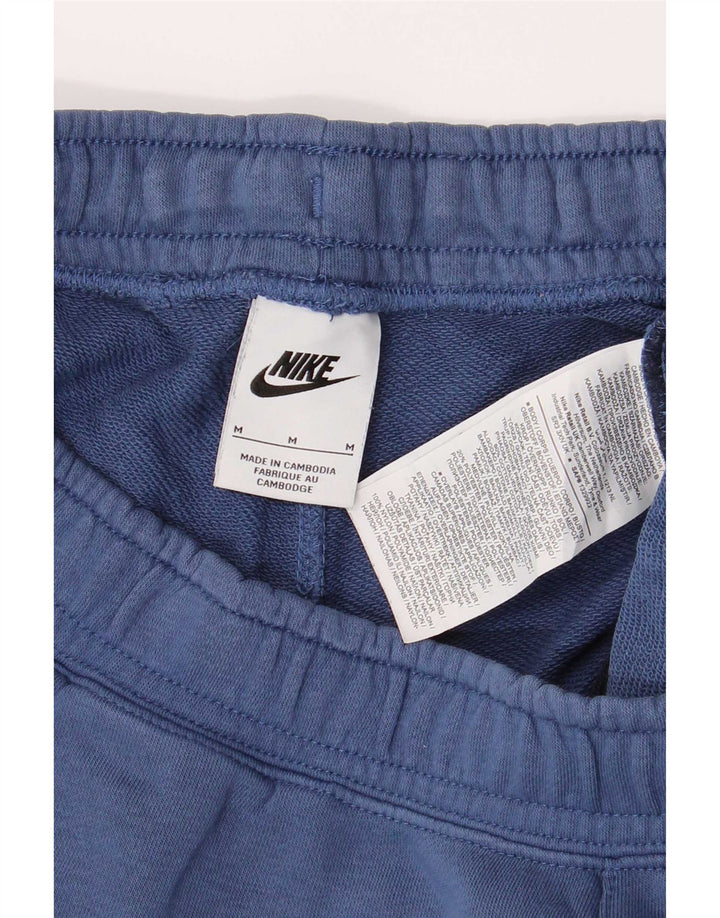 Pantalones cortos deportivos Nike de algodón color block en azul medio - Hombre