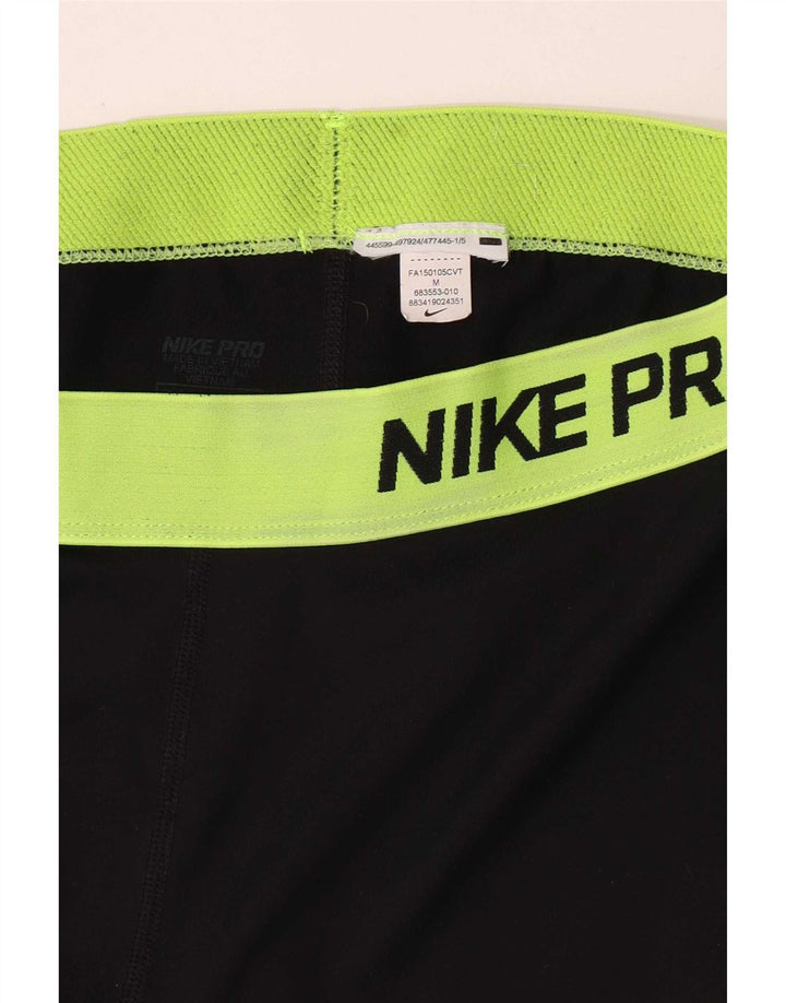 Nike - Leggings capri gráficos para mujer, talla 40, color negro mediano