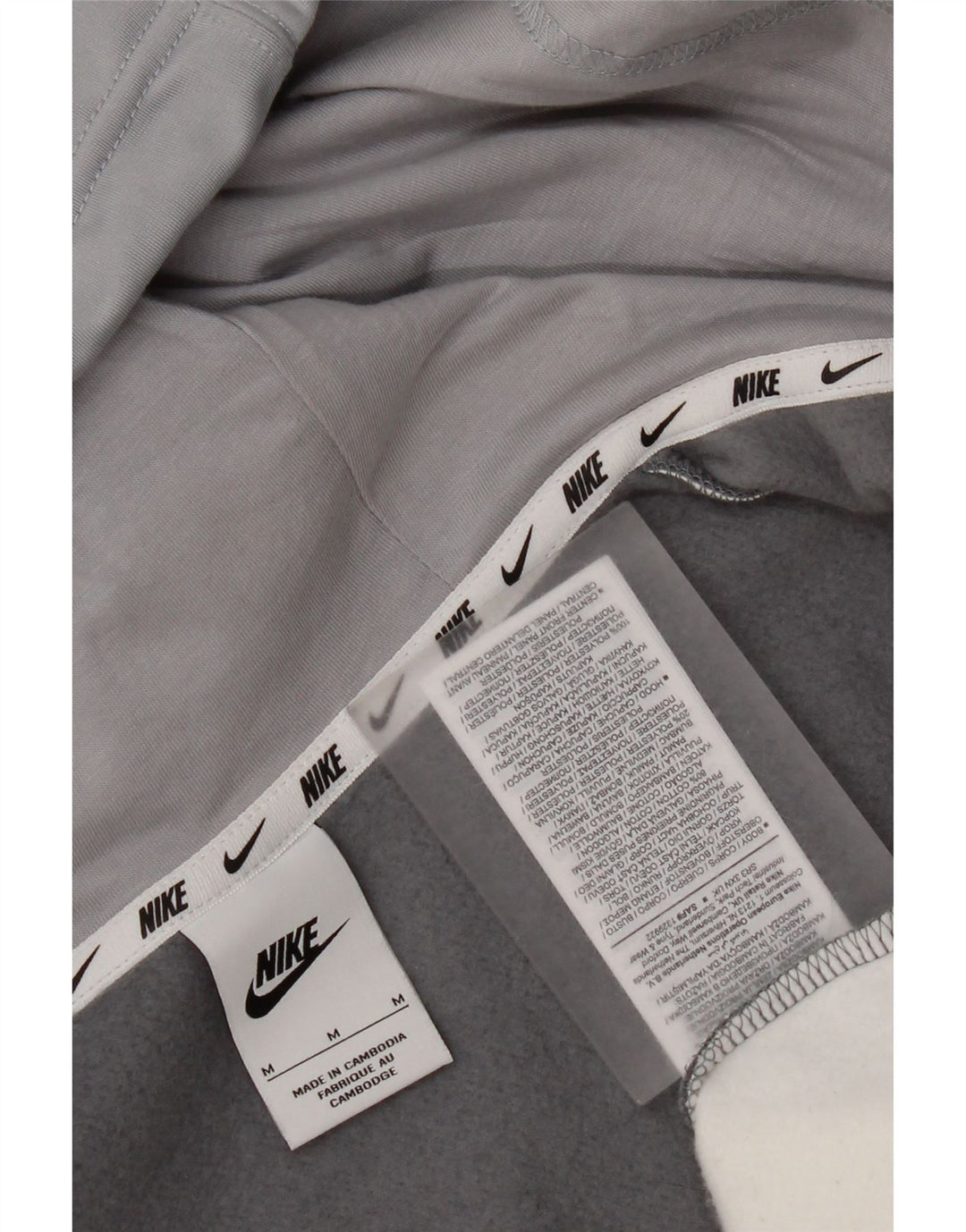 Nike Hombre Sudadera con capucha y cremallera gráfica de algodón en bloques de color gris medio