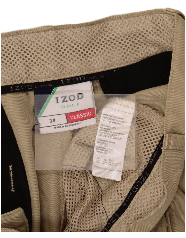 Izod Pantalones cortos cargo de ajuste clásico para hombre W34 Poliéster caqui grande