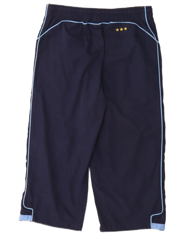 Nike Pantalones de chándal capri con gráfico gráfico en color azul marino mediano